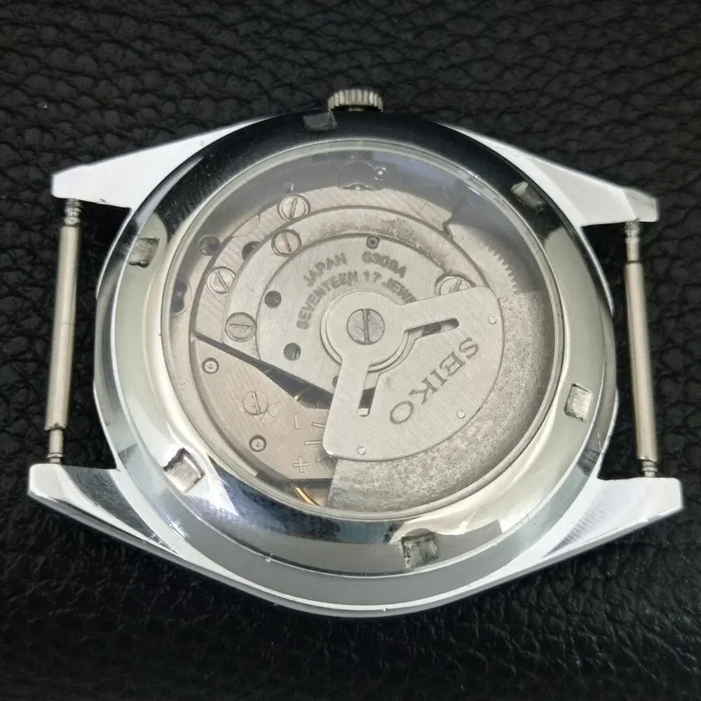 Vintage 1976 Seiko Automatic Mens Silver Watch W/daydate & Black accents
